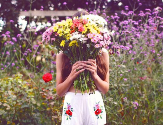 Thoughts of Girl Holding Flowers In Field