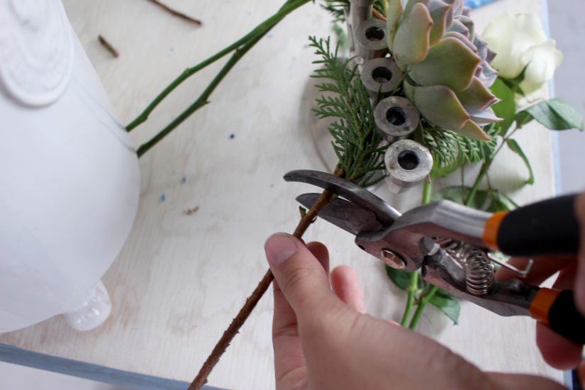 Clip greenery stems Clip greenery stems