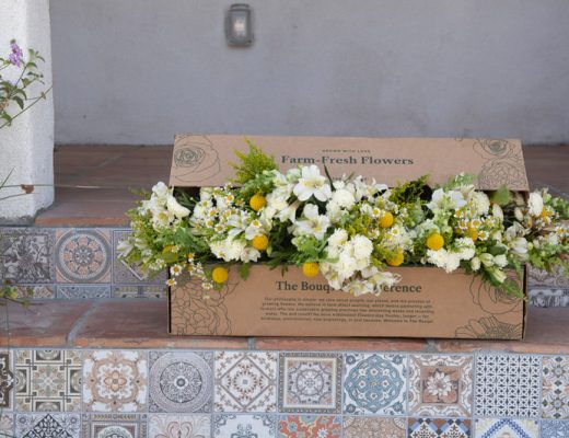 white and yellow bouquet in The Bouqs Co. delivery box