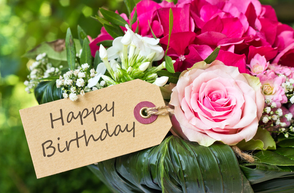 white, pink, and fuschia happy birthday flowers