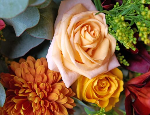 Close-up of a rose in a bouquet.