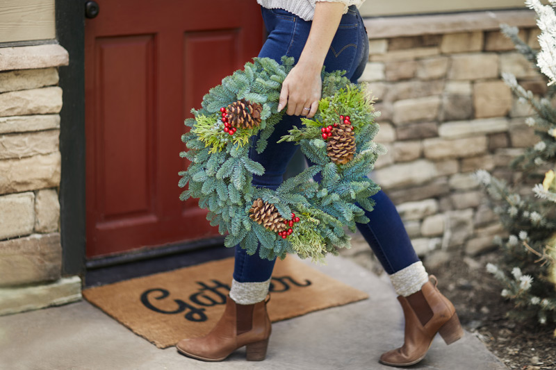 holiday wreath with pinecones for the front door