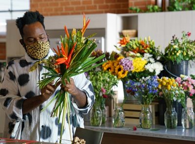 Maurice Harris arranging a bouquet