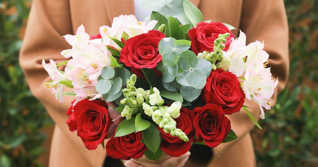 Bouquet with red roses and pink alstroemeria
