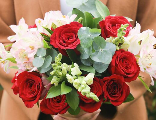 Bouquet with red roses and pink alstroemeria