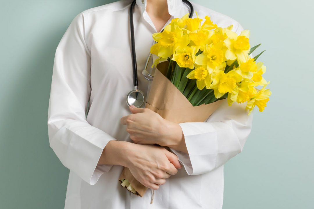 Nurse with flower bouquet