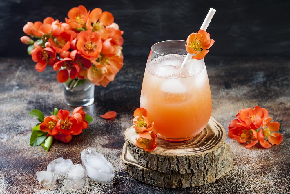 Prosecco cocktail with flowers