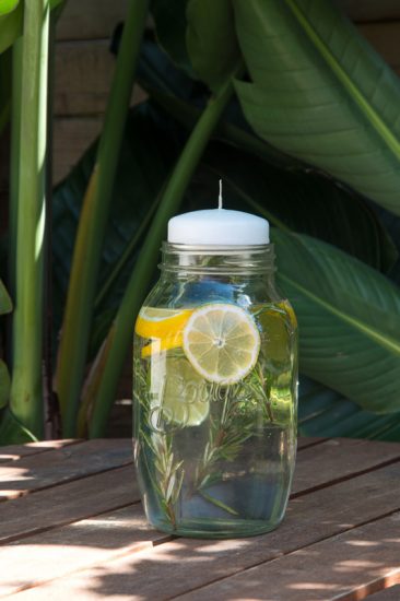 Mason Jar Citronella candle with lemon and limes floating in water