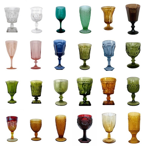 24 vintage wine and spirit glasses in various colors and shapes