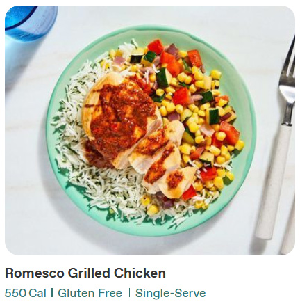 fresh dinner plate with chicken corn and rice