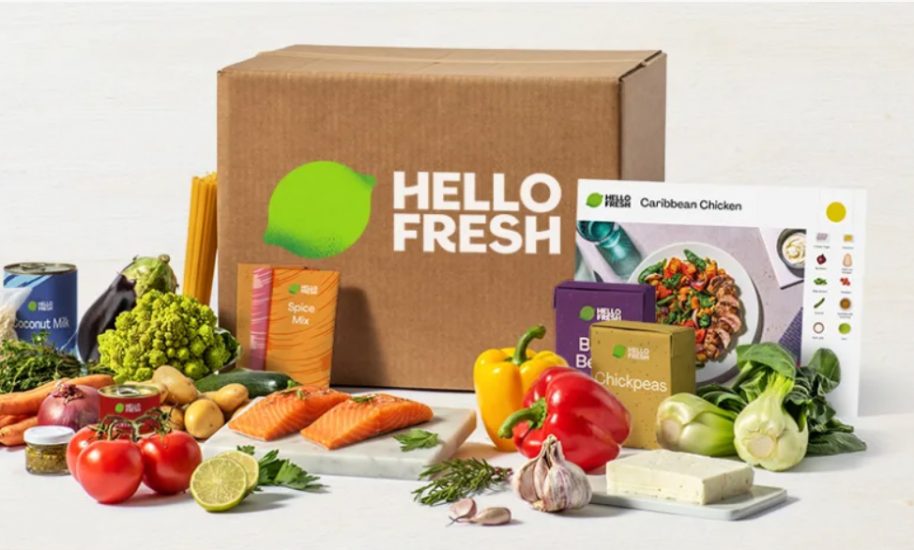 box with fresh produce, salmon, peppers, chickpeas and more healthy food