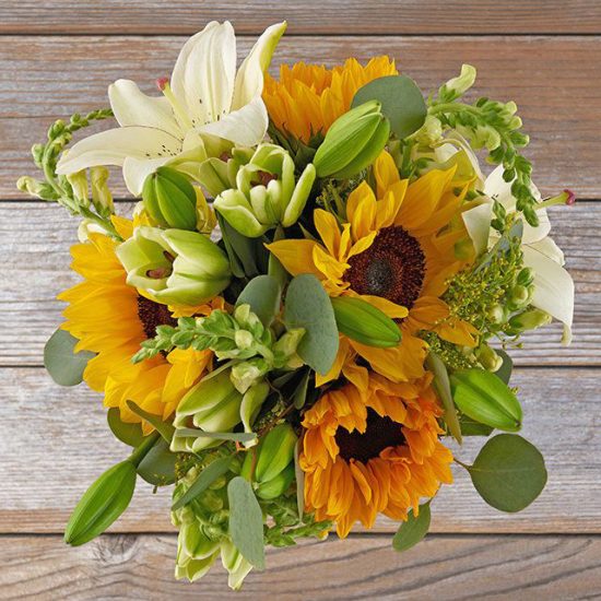 bouquet with sunflowers, white lilies and greenery
