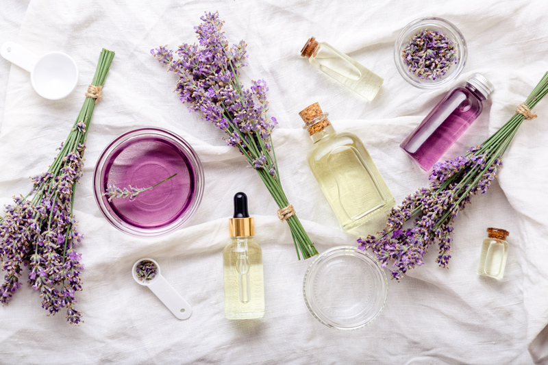 lavender flowers, oil vials and crushed petals to make flower oils