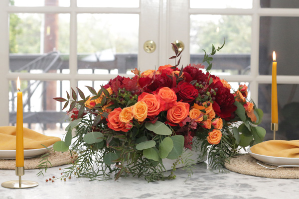 red and orange tablescape for thanksgiving