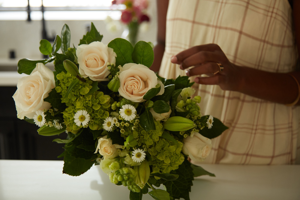 flower arrangement with green hydrangeas and other green flowers