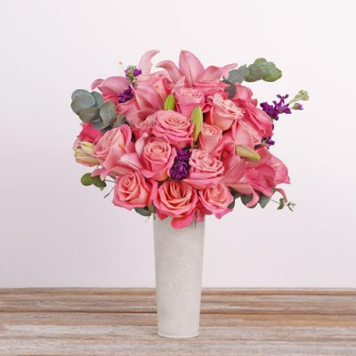 Pink roses bouquet with pink Asiatic lily.
