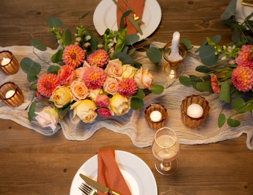peach and orange floral centerpiece for an event