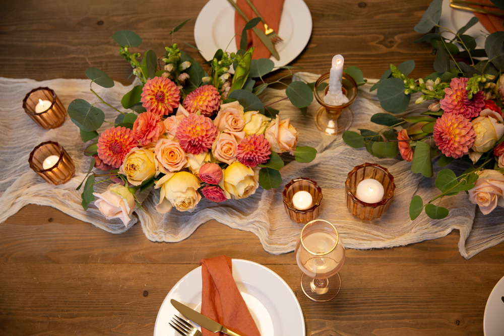 peach and orange floral centerpiece for an event