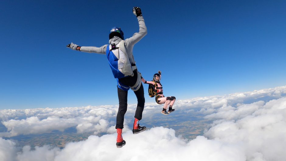 Man and woman skydiving together