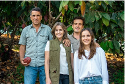 Maria Elvira poses with her family