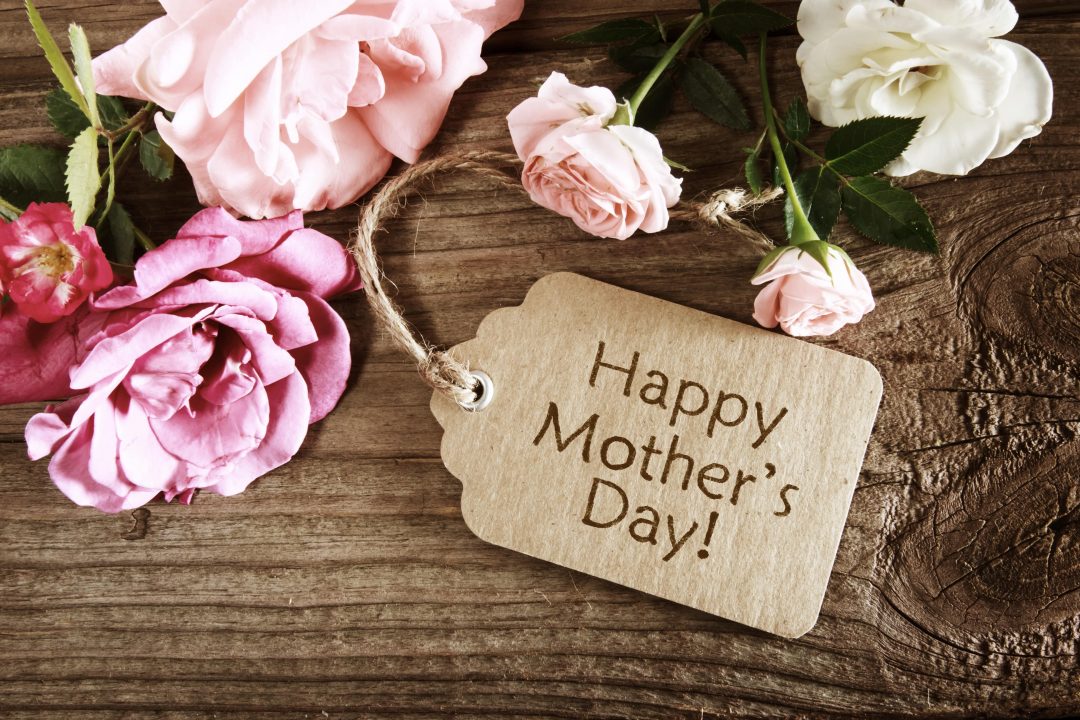 Gift tag with "Happy Mother's Day" alongside bright flowers