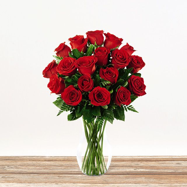 Arrangement with classic red flowers.